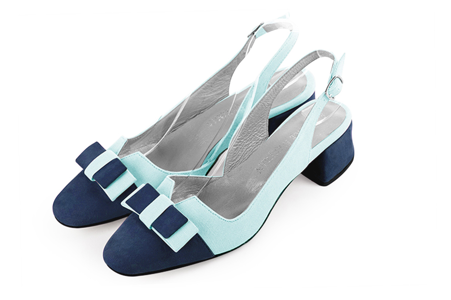 Navy blue women's open back shoes, with a knot. Round toe. Low flare heels. Front view - Florence KOOIJMAN